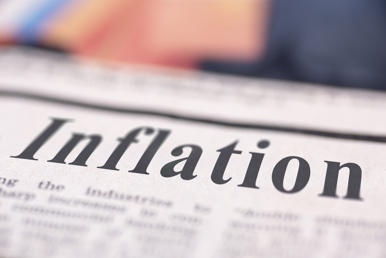 Newspaper headline reading inflation