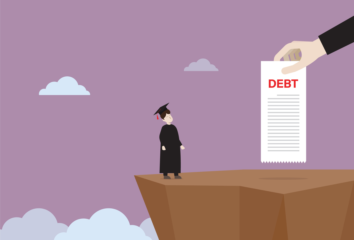 A graduate student stands on a cliff with a student debt bill