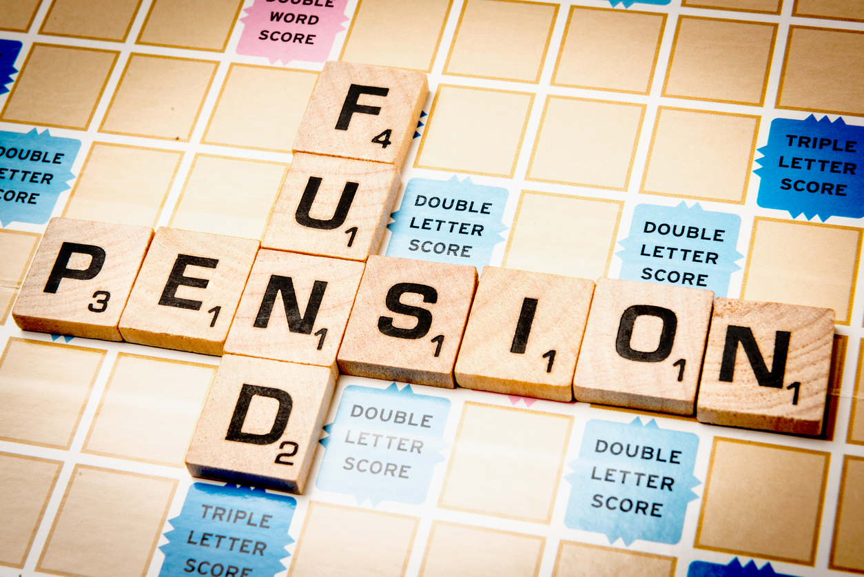 Board game like Scrabble with pieces spelling out the words 'Pension' and 'Fund' - Pension planning for business owners
