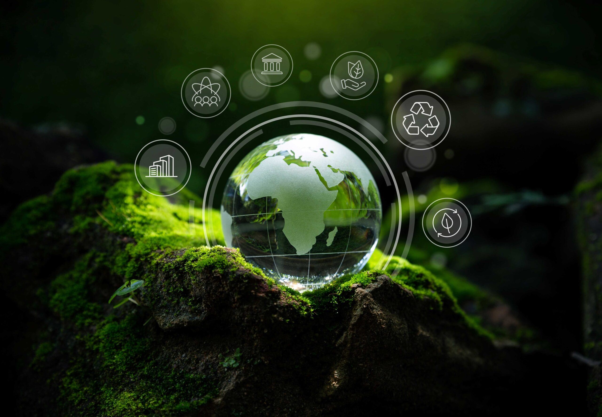 Graphic of a globe resting on a grassy ledge representing socially responsible investments